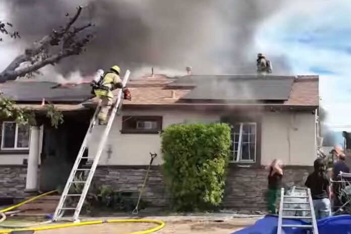 Crawling Through Fire: Brave Firefighters Rescue Woman in Harrowing Blaze