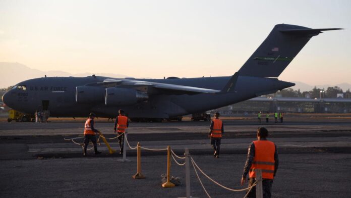 Aerial Shift: First Military Aircraft Touches Down in Guantanamo with Deported Migrants